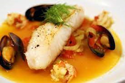 Chilean Sea Bass with Bouillabaisse Broth. French dishes with saffron